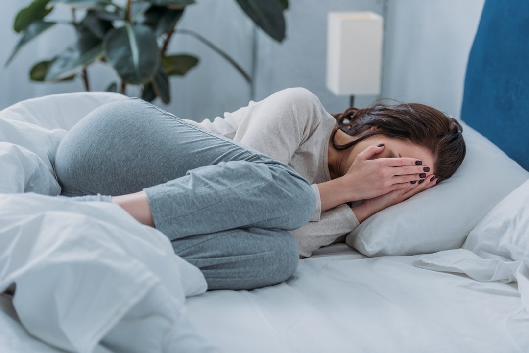 6206f2a53eb08520540f943b VistaCreate 243471800 stock photo depressed woman lying bed crying p 1080